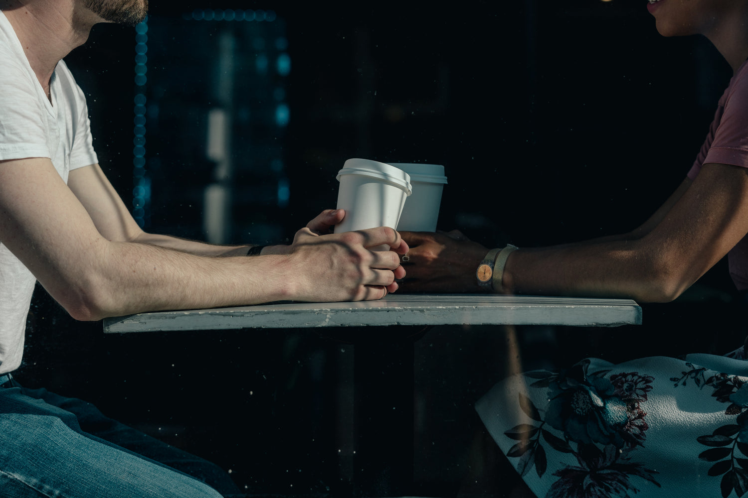 A couple on a date at a coffee shop